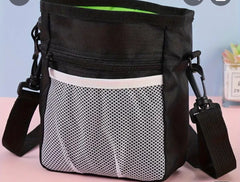 Dog Multi pocket walking bag includes * Free bag of treats.
