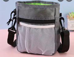 Dog Multi pocket walking bag includes * Free bag of treats.